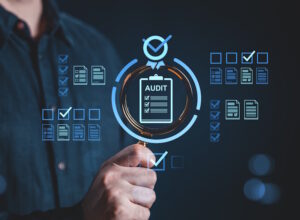 Magnifying glass over the word AML audit